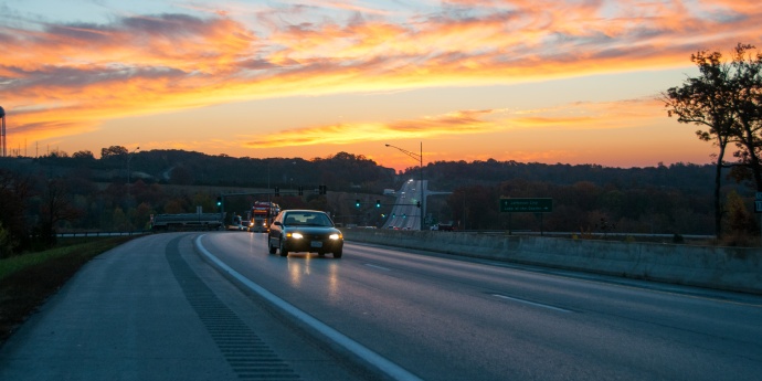 cars driving down the road