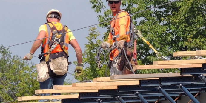 Workers on an elevated platform