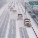 a line of snow plows