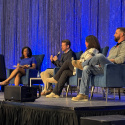 Four people on panel discussion